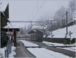 The MOB GDe 4/4 6002 is arriving with his MOB Panoramic Express from Montreux to Zweisimmen  at the Les Avants Station.