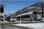 The MOB ABt 344 - Be 4/4 5004 - Bt 244 (->  Lenkerpendel ) in Lenk im Simmental.
In the background MOB Panoramic wagons and the ABDe 8/8 4004  Fribourg 
 25.01.2022
