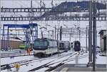 The MOB Ge 4/4 8002 is leaving with his GoldenPass Express GPX 4065 from Interlaken Ost to Montreux from the Station of Zweisimmen.