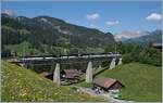 A MOB Ge 4/4 wiht a MOB Service from Montreux to Zweismmen on the Gruben Viadukt by Gstaad.

02.06.2020