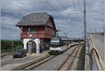 The MOB ABe 4/4 9302 wiht his local train service is on the way from Zweisimmen to Montreux  and makes a stop in Chamby.