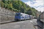 The MOB Ge 4/4 8001 with his GoldenPass Express from Montreux to Interlaken Ost in the Chamby Station. This service dont makes a stop in Chamby. 

14.09.2025