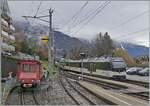 The MOB GoldenPass Express from Interlaken Ost to Montreux meets the CEV Te 2/2 No. 82 in Chernex.

20 February 2026 