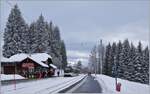 The snow-covered Les Pleiades summit station with the CEV MVR ABeh 2/6 7505 in the station.