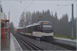 In foggy summit weather, the CEV MVR ABeh 2/6 has arrived on track 2 at Les Pleiades. Only partially visible: the station building on the left side of the image is being renovated. Also only partially in the picture: in the background stands the HGm  ...