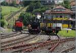 For the return journey of the special train from Balsthal to the Gotthelf Market in Sumiswald, the two OeBB Ee 936 153 (UIC Ee 91 85 4 936 153-6 CH-OeBB) and SCB C 4 / SBB Ed 2x 2/2 7696 / UIC 90 85 00 07 696-7 are shunting in Sumiswald Grünen.
 ...