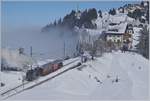 The RB (Rigi Bahnen) Steamer train with the H 2/3 16 is arriving at Rigi Staffel.