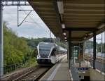 A local train to Schaffhausen is arriving in Neuhausen am Rheinfall on September 13th, 2012.
