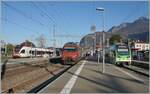 Aigle with a RABe 523 as a regional train towards Lausanne, an SBB Re 460 with an IR to Brig, and the TPC Beh 2/6 542 as a regional train towards Monthey.

Oct 30, 2024