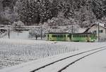 The ASD BDe 4/4 401 with his Bt on the way to Les Diablerests over Aigle.