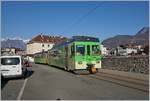 The ASD BDe 4/4 404 and his Bt by the Stop  Aigle Marché .