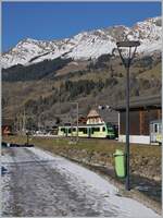 Photographed across the station, the image shows the TPC ABe 4/8 472, waiting to depart for Aigle.  
30 November 2024