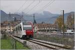 A TPF local train on the way to Montbovon on the lastest day of the  old  Châtel St Denis station (to see in the background). 

28.10.2019