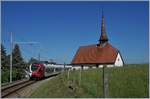 The TPF RABe 527 195 on the way to Bulle by Vaulruz.