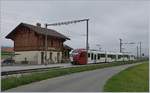 The TPF ABe 2/4 / B / Be 2/4 104 from Bulle to Palézieux by his stop in Vaulruz Sud.