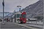 The TPF local train with the Be 4/4 121, B 207, B209 and ABt 221 is waiting in Montbovon to is departure to Bulle.