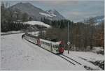 The TPF local train with the Be 4/4 121, B 207, B209 and ABt 221 by Lessoc on the way to Montbovon.