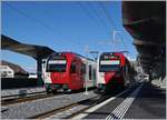 The TPF SURF ABe 2/4 B Be 2/4 101 and 104 in Châtel St-Denis.