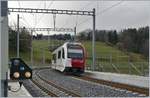 A TPF local train on the way to Paléziex at the Châtel St-Denis Railway Station.