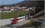 The TPF Be 4/4 with his Bt 224 and ABt 223 by the Broc Fabrique Station.