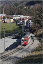 The TPF Be 4/4 with his Bt 224 and ABt 223 by the Broc Fabrique Station.