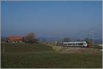 The TPF RABe 527 191 on the way to Fribourg by Vuisternens-devant- Romont.