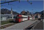 The ABt 223 Bt 224 and the Be 4/4 124 are the local TPF service from Broc Farbrique to Bulle by his stop in Broc Village.