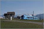 The TPF  Groupe Grisoni  TPF RABe 527 198 on the way to Bulle near Vaulruz.