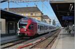 The TPF Flirt RABE 527 196 in Neuchâtel.