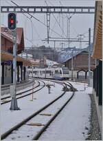 The TPF Surf Be 2/4 - B - ABe 2/4 106 is arriving at the Montbovon Station.