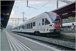 In Neuchâtel, the TPF RABe 527 196 is waiting as R21 to Fribourg for departure.

August 24, 2026