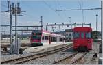 The TRAVYS GTW ABe 2/6 2001 and the Bt 51 in Yverdon les Bains.