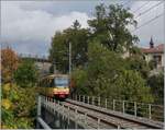 The TRAVYS/OC Be 4/8 003 on the way to Chavornay between the Orbe Station and St-Eloi on the Orbe bridge.