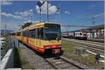 The Travys OC Be 4/8 No. 3 (94800 450 003-9 D-TVYS) is waiting his departure to Orbe in Chavornay. 
In the backgroudn the connecitng servic to Yverdon. 
July 5, 2025