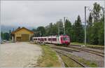 The TRAVYS Domino wiht the RBDe 560 385-7 (RBDe 560 DO TR 94 85 7 560 385-7 CH-TVYS) on the way form Le Brassus to Vallorbe in Le Pont is waiting the incomming train.