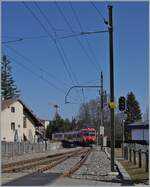 A TRAVYS local train from Vallorbe to Le Brassus is arriving at Sentier Orient.