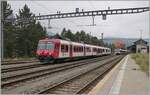 A TRAVYS RBDe 560 Domino on the way to Le Brassus is leaving the Vallorbe Station.