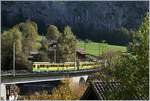 A WAB local train service from the Kleine Scheidegg is arriving at Lauterbrunnen.