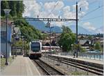 A zentralbahn IR from Luzern to Interlaken is arriving at Brienz.