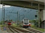 The new ABeh 160 001-1 in Interlaken Ost. In the Background is arriving the De 110 022-1 with an IR from Luzern.
01.06.2012