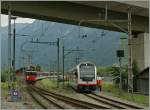 The new ABeh 160 001-1 in Interlaken Ost. In the Background is arriving the De 110 022-1 with an IR from Luzern.
01.06.2012