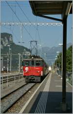 The De 110 022-1 with his IR from Interlaken to Luzern is arriving at Meiringen.