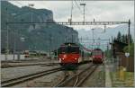 The old De 110 003-1 is arriving with his  Goldenpass  IR at Meiringen.