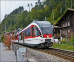 . A ZB local train to Meiringen is leaving Brienz on September 29th, 2013.