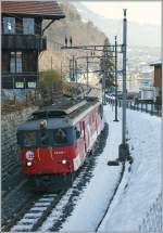 Zentralbahn  zb  De 110 022-1 with a Goldenpass Service by Brienz.