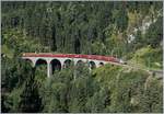 The RhB Ge 4/4 III 649  20 Minuten  with his Albula Fast-Serice from Chur to St Moritz by Filisur. 

12.09.2016