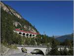 A RhB Ge 6/6 with a Alulba Fast Service to St Moritz between Bergün and Preda.