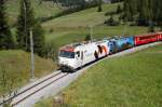 Ge 4/4 III no 648  Holcim  and no 647  Swisscanto  at Bergn, September 2nd, 2006.