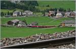 Two RhB Ge 4/4 I wiht a  Albula  fast train Service by Bergün on the way to St Moritz.