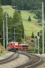 Ge 4/4 with the Bernina Express is arriving at Bergn station. 
19.09.2009 